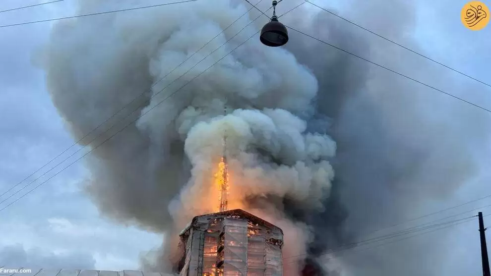 تصاویر - ساختمان تاریخی بورس دانمارک تسلیم شعله های آتش شد