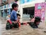 خیابان های چین در آب غرق شد + ویدئو  -  حجم سیلاب را ببینید