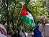 پرچم فلسطین بر گردن نخستین رئیس جمهور آمریکا!  -  عکس