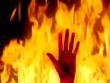 ویدیو  -  مجازات ترسناک یک سارق در آفریقا؛ آویزان کردن سارق روی آتش!