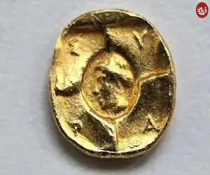 سکه طلایی با تصویر (هرکول) در یک قبرستان پیدا شد + عکس