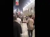 آشتی دو هیئت چوب زنی در حرم امام رضا(ع) + ویدئو  -  این بار به جای چوب به هم گل دادند