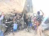 تصویری از لاشه جنگنده f-15 عربستان زیر پای یمنی ها