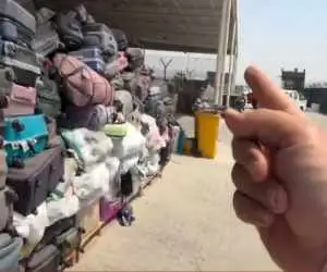 لحظات وسوسه انگیز آنباکسینگ چمدان های ناشناس و هیجان کشف طلا  -  ویدئویی وایرال شده از فروش و بازکردن چمدان های جامانده مسافران در فرودگاه